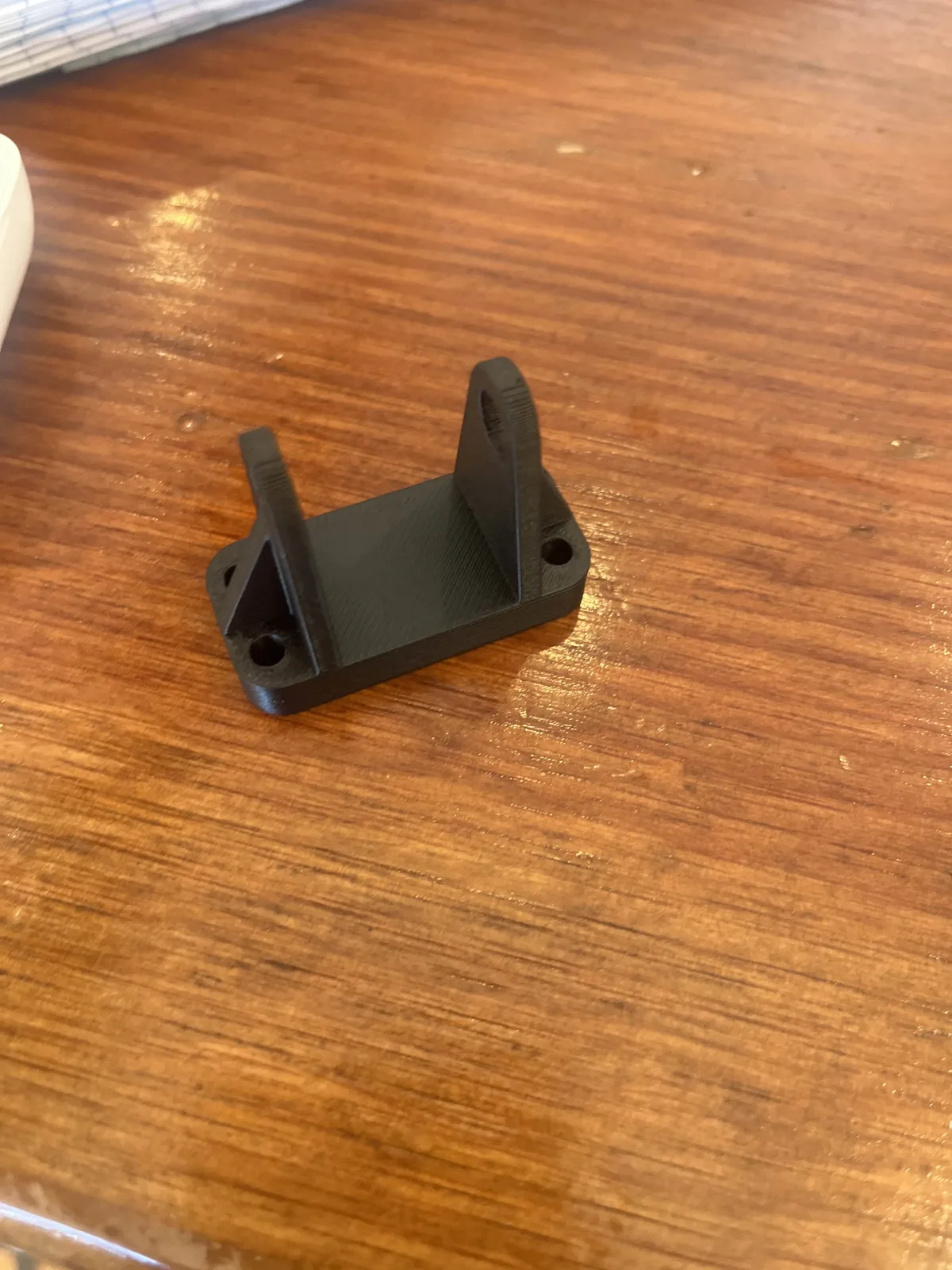 Earlier 3D-printed elevator pulley body before the reinforced redesign